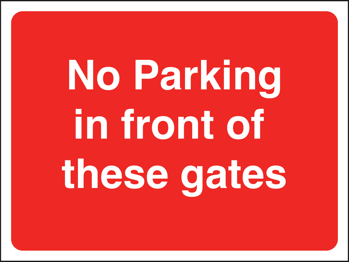 No Parking in front of these gates traffic sign